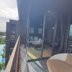 2-bedroom fully furnished sea view condo Soi Saiyuan, Rawai, Phuket terrace and pool view PSC-RAW-376