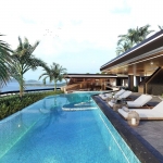 1-2 bedroom condos with 5-star hotel license near Nai Harn Beach, Phuket rooftop pool and loungers PSC-NAH-485