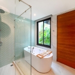24-Bedroom Boutique Villa & Hotel Resort in Thalang, Phuket bathroom with pale blue herringbone tiles and bathtub PSR-THA-642