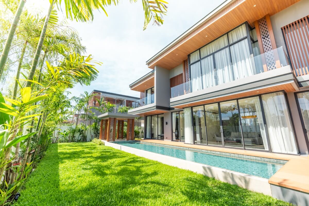 4-bedroom pool villas in the Laguna Area, Cherng Talay, Phuket exterior shot of villa with pool and garden PSV-CHE-902