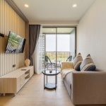 1-bedroom resort condos for sale in the Laguna area near Bang Tao Beach, Phuket living room and terrace PSC-BAN-976