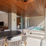 3-4 bedroom condos and penthouses near Layan Beach, Phuket bedroom with access to terrace with jacuzzi pool and dining table PSC-LAY-1038