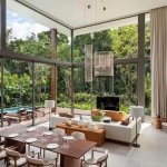 3-4 bedroom pool villas in the 5-Star Layan Bay area, Phuket living and dining area with double height glass walls and pool access PSV-LAY-1041