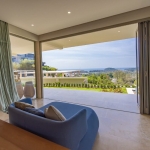 3-6 bedroom sea view pool villas near Layan Beach, Phuket living blue couch facing the ocean PSV-LAY-1114