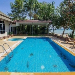 3 Bedroom Beachfront Pool Villa For Sale in the Chalong Bay Area in Rawai, Phuket