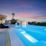 1-2 bedroom sea view condos near Chalong Bay and ISP in Rawai, Phuket pool in evening PSC-RAW-1278