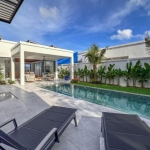3-4 bedroom pool villas near ISP in Rawai, Phuket pool deck with sun loungers PSV-RAW-1078