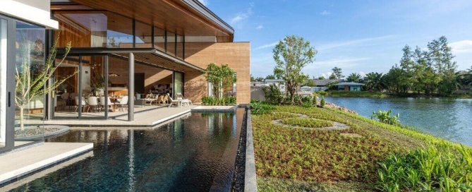 3-4bedroom pool villa near Bang Niew Dam in Baan Manik, Phuket exterior view of villa and lakeside PSV-MNK-1329