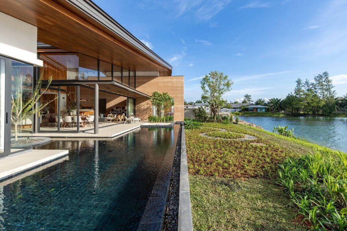 3-4bedroom pool villa near Bang Niew Dam in Baan Manik, Phuket exterior view of villa and lakeside PSV-MNK-1329