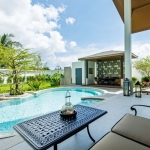 3-bedroom pool villa for sale in Pru Jampa near UWC Phuket with outdoor furniture beside pool PSV-PRJ-1429