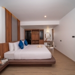 6+1 bedroom villa in Pasak, Cherng Talay, Phuket bedroom with royal blue throw pillows on bed PSV-CHE-1419