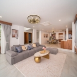 6+1 bedroom villa in Pasak, Cherng Talay, Phuket open plan living, dining and kitchen area showing stairs to upper levels PSV-CHE-1419