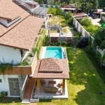 4-bedroom pool villas in Baan Manik, Phuket aerial view showing pool and lawn PSV-MNK-1267