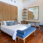 4-bedroom pool villas in Baan Manik, Phuket bedroom with blue bed bench PSV-MNK-1267