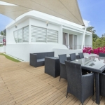 4-bedroom pool villa with basement & roof terrace in Cherng Talay, Phuket - roof terrace with outdoor furniture