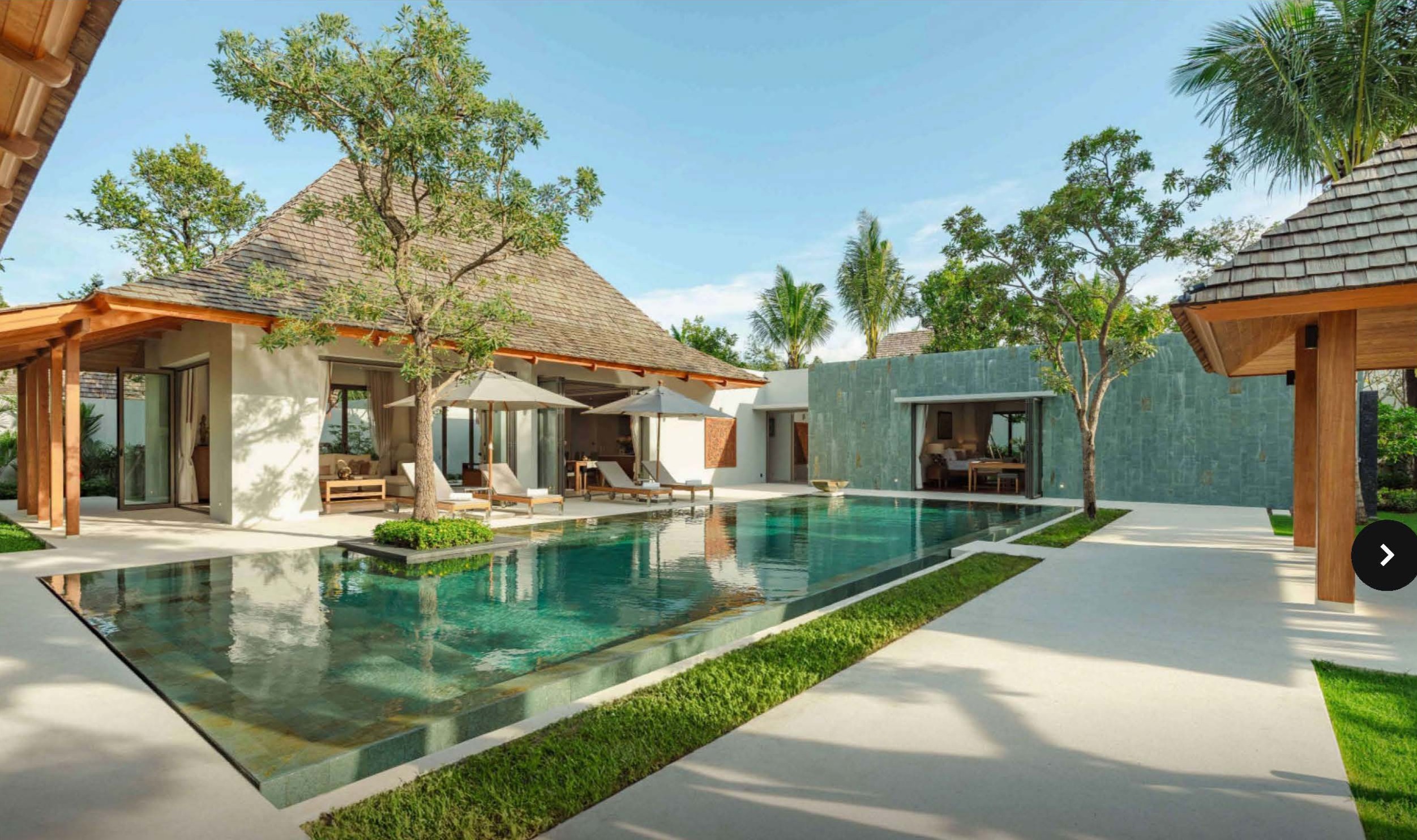 Outdoor sala and swimming pool at Anchan Tropicana Phuket