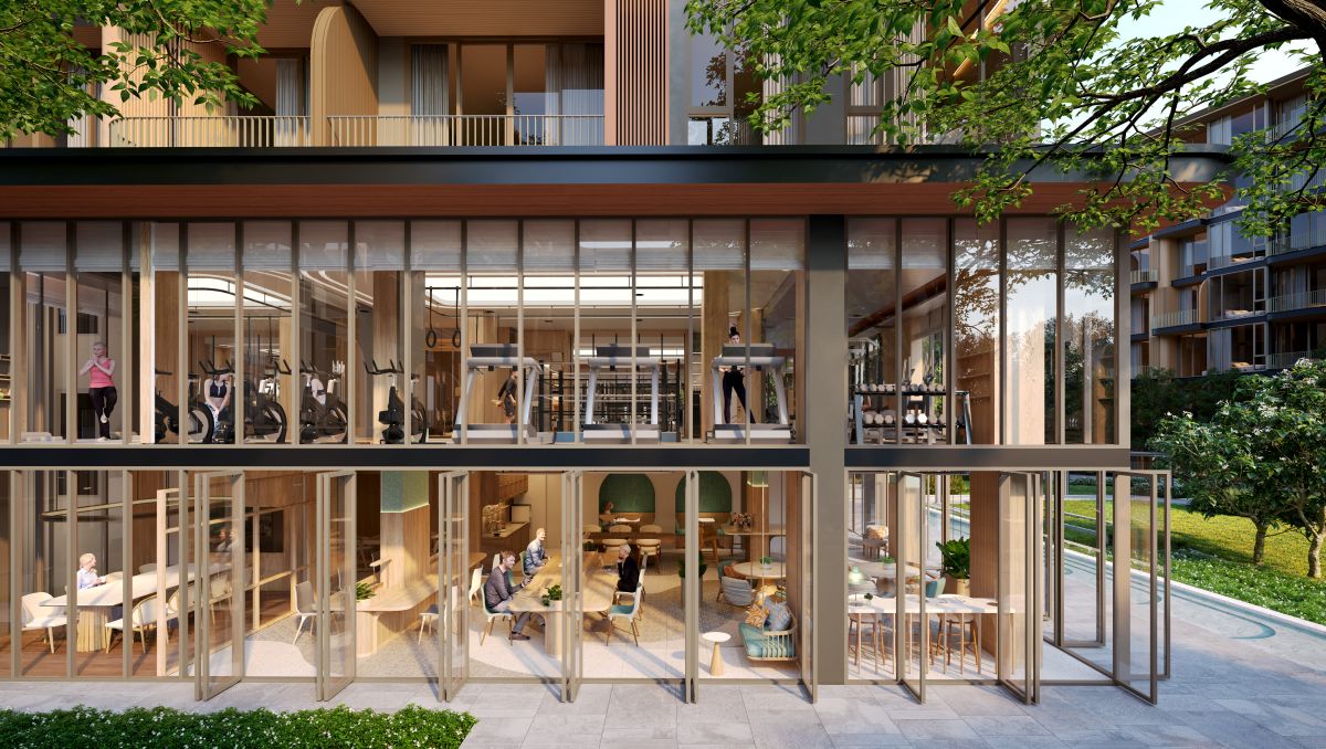 Modern fitness centre and tranquil library at Peylaa Phuket, offering state-of-the-art gym equipment alongside a peaceful reading area with comfortable seating and natural lighting, designed for wellness and relaxation.