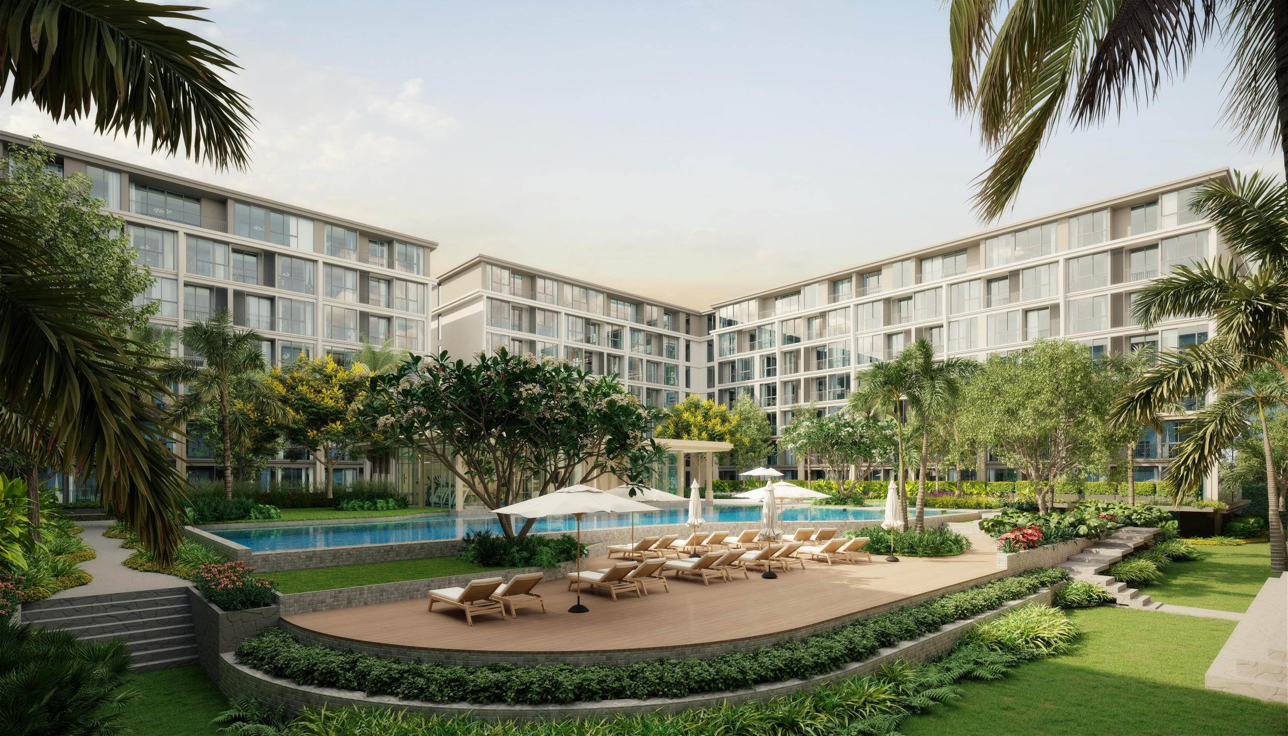 Bright open-plan living area with high ceiling in The Ozone Villas Bang Tao