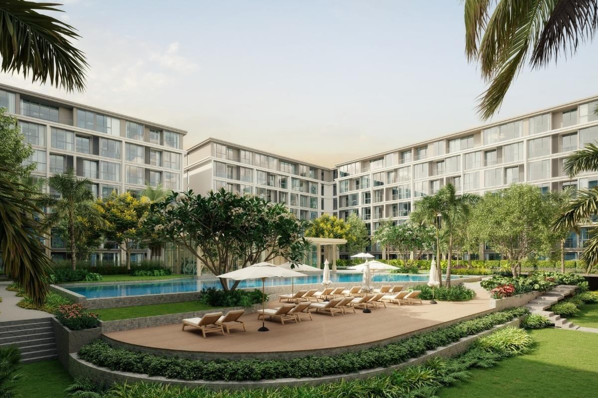 Bright open-plan living area with high ceiling in The Ozone Villas Bang Tao.