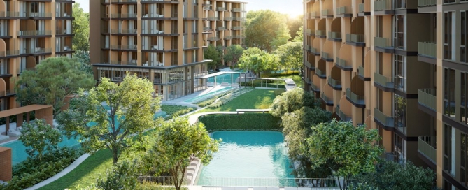 Aerial view of Peylaa Phuket Bang Tao – three low‑density, seven‑storey condominium buildings in a U‑shaped layout around a central landscaped courtyard with multiple pools, set within lush greenery and glimpses of the Andaman coast in the distance.