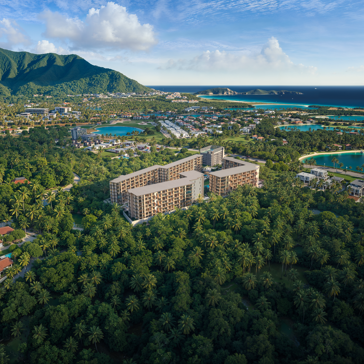 Modern tropical-style condominium at Peylaa Phuket featuring sleek architecture, spacious balconies, and resort-style amenities surrounded by palm trees and landscaped gardens near Bang Tao Beach.