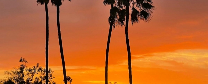 Stunning sunset over Nai Harn Beach in Phuket - a popular retirement destination with retirement condos and villas for sale
