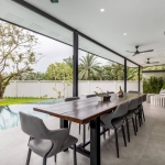 4-bedroom family pool villa for sale on large plot in Pa Klok, Phuket – 60 sqm covered poolside terrace