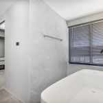 4-bedroom family pool villa for sale on large plot in Pa Klok, Phuket – bathroom with bathtub