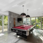 4-bedroom hillside sea view pool villa Surin Beach, Phuket red pool table and sliding glass doors PSV-SUR-800