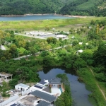 5-bedroom lakefront luxury pool villa Baan Manik, Phuket - aerial view with dam & mountains