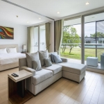 1-bedroom condo laguna phuket bedroom & living area psc-lag-1489