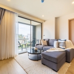2-3 bedroom resort condos for sale in the Laguna area near Bang Tao Beach, Phuket living room and terrace PSC-BAN-1507