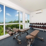 2-bedroom condos with private pools near Chalong Bay and ISP in Rawai Phuket view of free weights PSC-RAW-1492