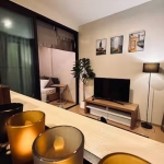 2-bedroom condo across boat avenue in Bang Tao, Phuket tv and bedroom PSC-BAN-1525