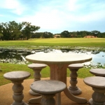 4-bedroom lakeside pool villa for sale in Laguna, Phuket seating area beside lagoon PSV-LAG-1524