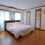 5-bedroom pool villa on large plot near Nai Harn Beach, Phuket bedroom with floor to ceiling windows PSV-NAH-1519