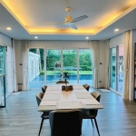6-bedroom pool villa on large plot near BISP in Koh Kaew, Phuket dining area with pool access PSV-KOH-1526