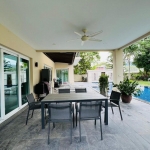 6-bedroom pool villa on large plot near BISP in Koh Kaew, Phuket undercover terrace with outdoor dining PSV-KOH-1526