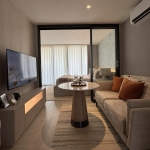 1-2 bedroom condos in Karon, Phuket open living room with tv and separate bedroom PSC-KAR-1536