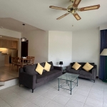 1-bedroom ground floor condo in Laguna, Phuket living area with brown couch PSC-LAG-1535