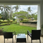1-bedroom ground floor condo in Laguna, Phuket covered terrace overlooking lawn PSC-LAG-1535