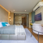 1–2 bedroom condos for sale near Kata Beach, Phuket bedroom, dining table and kitchen area PSC-KAT-1547