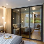 1–2 bedroom condos for sale near Kata Beach, Phuket sliding glass doors leading to dining area PSC-KAT-1547