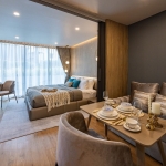 1–2 bedroom condos for sale near Kata Beach, Phuket interior showing dining area and bedroom PSC-KAT-1547