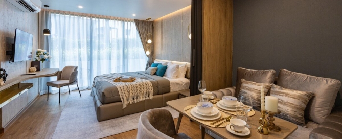 1–2 bedroom condos for sale near Kata Beach, Phuket interior showing dining area and bedroom PSC-KAT-1547