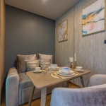 1–2 bedroom condos for sale near Kata Beach, Phuket dining area with pull out bed PSC-KAT-1547