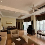 3-bedroom golf course view pool villa in Laguna, Phuket dining and kitchen area with floor to ceiling sliding glass doors PSV-LAG-1549