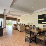 3-bedroom golf course view pool villa in Laguna, Phuket dining and kitchen area with terracotta floor tiles PSV-LAG-1549