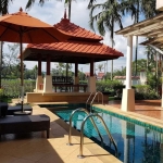 3-bedroom golf course view pool villa in Laguna, Phuket swimming pool, sun loungers and sala PSV-LAG-1549
