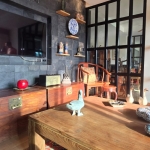 3-bedroom sea view condo near CoCo Pier in Panwa, Phuket coffe table, tv and oriental decors PSC-PAN-1550